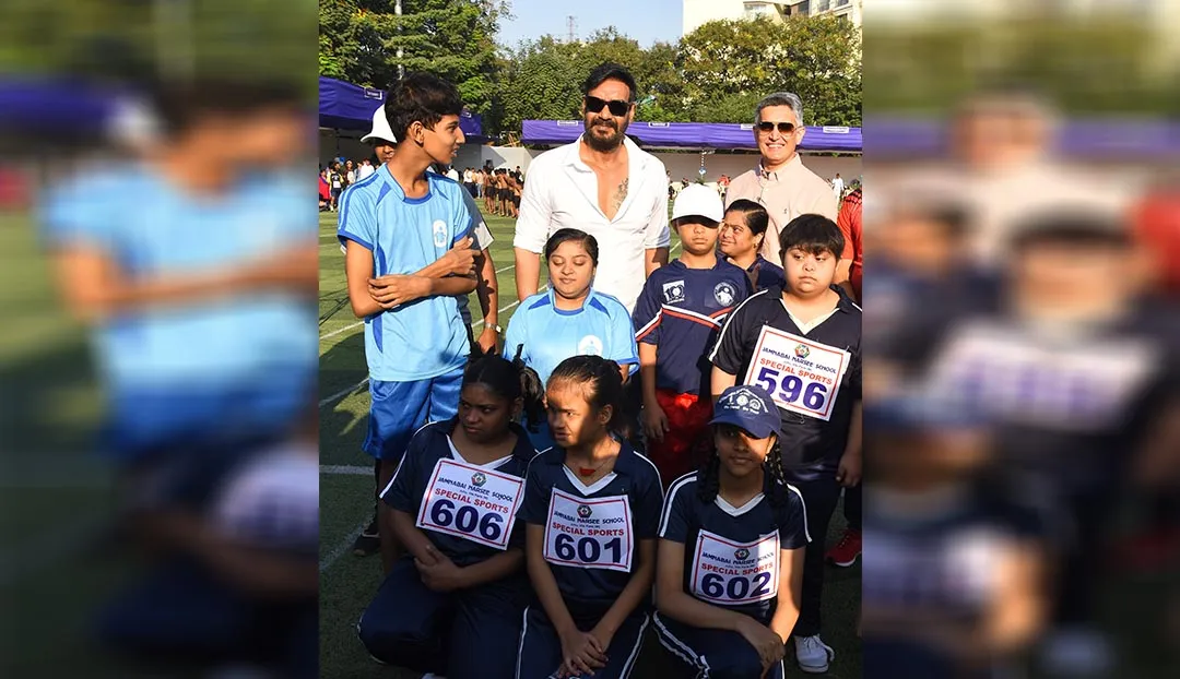 Ajay Devgn and Sujay Jairaj interacting with the kids at the Jamnabai Narsee Campus For The Differently Abled Children's Sports Day